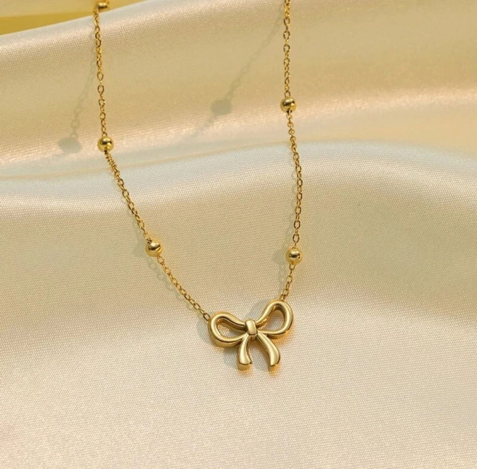 Minimalist Gold Bow Pendant Necklace for Women - Image 3